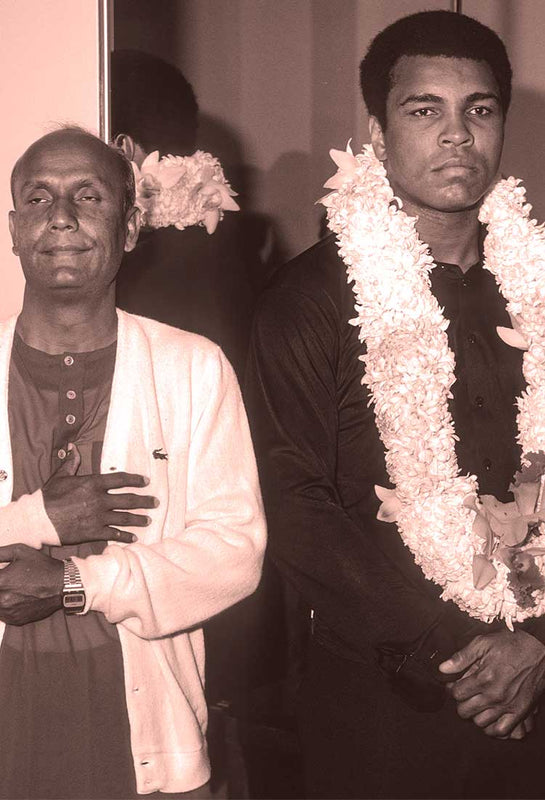 Sri Chinmoy with Muhammad Ali in picture.