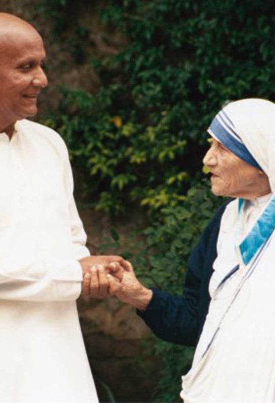 Sri Chinmoy with Mother Teresa in picture.